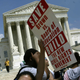 Activists organized by BAMN (By Any Means Necessary) rally in front of the US Supreme Court to mark the anniversary of the Brown vs Board of Education decision May 15, 2004 in Washington, DC.
